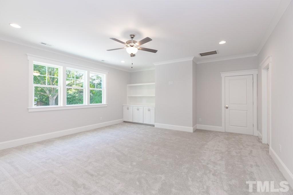 3319 Lake Boone Trail Raleigh, NC 27607 - Photo 26 of 30 an empty room with windows and fan