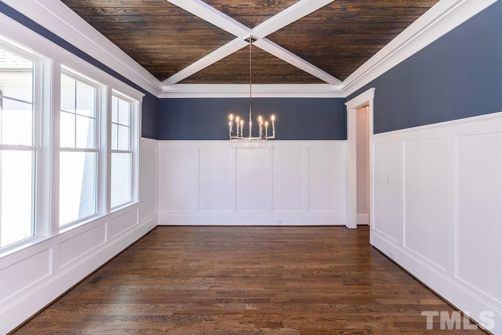3319 Lake Boone Trail Raleigh, NC 27607 - Photo 10 of 30 an empty room with wooden floor and windows