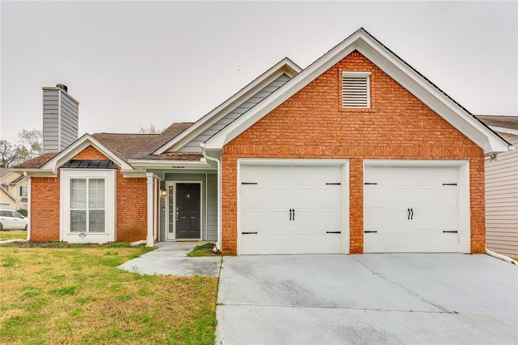 3171 Ozmer Landing Decatur, GA 30034 - Photo 1 of 1 a front view of a house with a yard