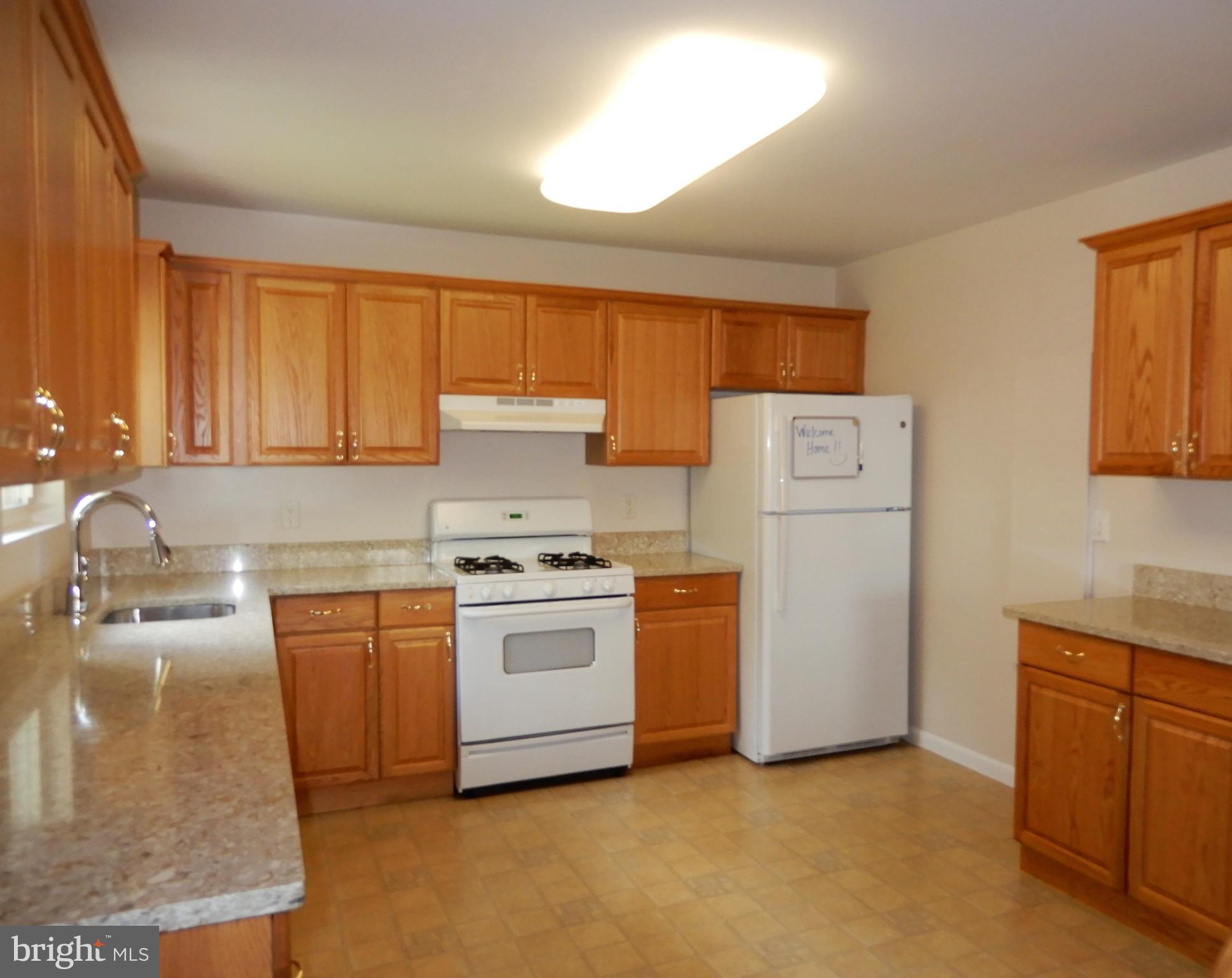 613 Eliot Road Pasadena, MD 21122 - Photo 14 of 46 Country Kitchen w/Granite Counters, New Cabinets
