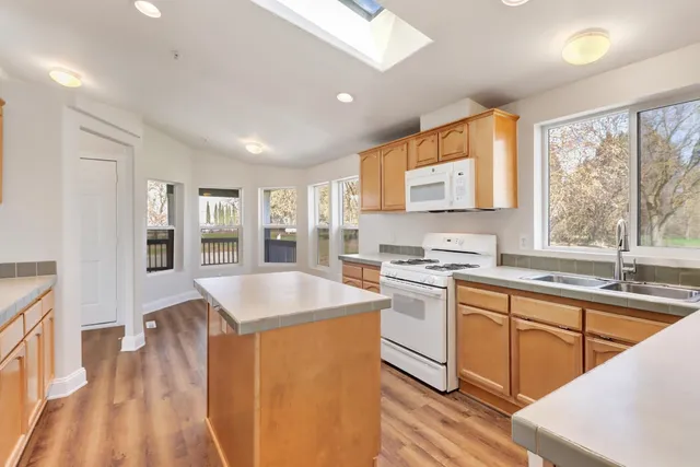 a view of an empty walk in closet with empty racks