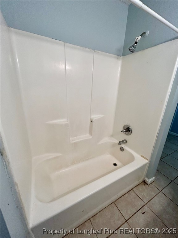 6320 Marykirk Drive, Unit C Fayetteville, NC 28304 - Photo 13 of 14 a bathroom with a bathtub and a shower