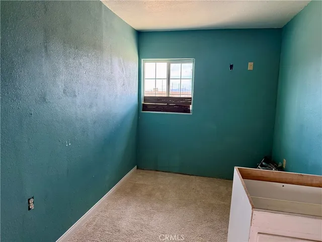 a room with closet and window