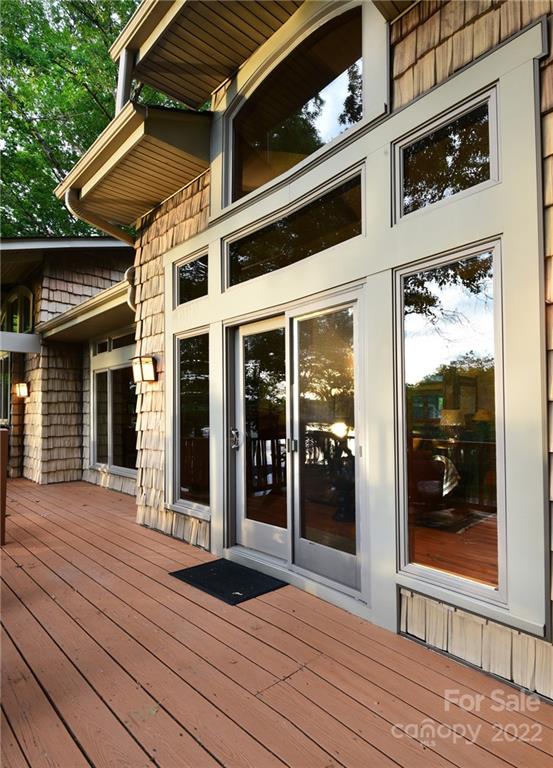 175 Clearview Point Drive Mount Gilead, NC 27306 - Photo 11 of 48 a view of a house with glass door