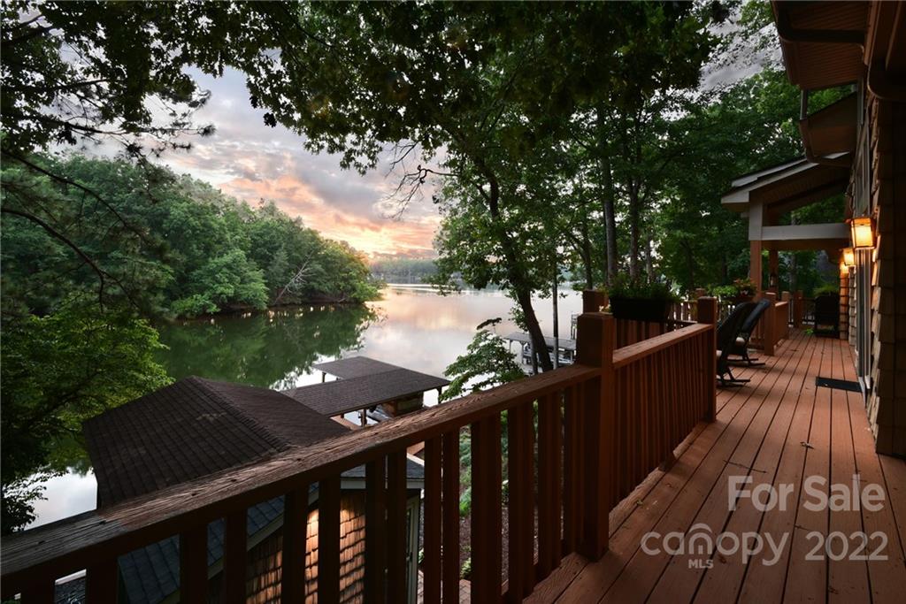 175 Clearview Point Drive Mount Gilead, NC 27306 - Photo 13 of 48 a view of balcony with wooden floor and fence