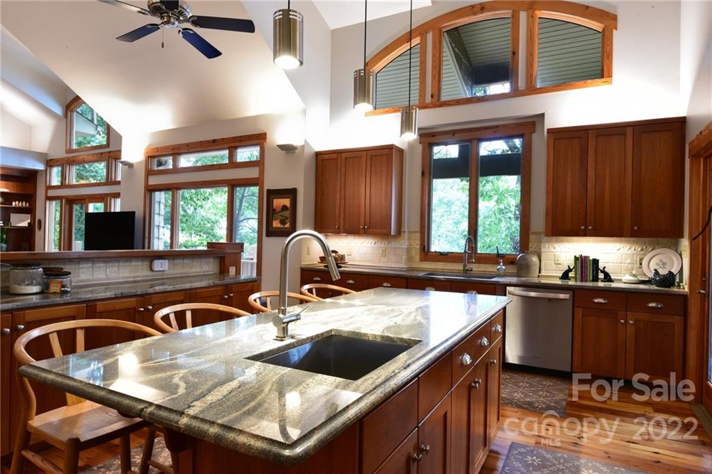 175 Clearview Point Drive Mount Gilead, NC 27306 - Photo 18 of 48 a kitchen with a stove a sink and a refrigerator