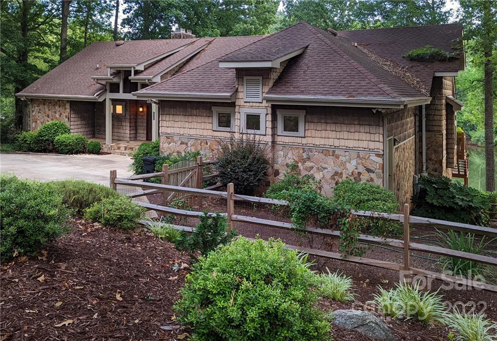 175 Clearview Point Drive Mount Gilead, NC 27306 - Photo 48 of 48 a house that has a lot of plants in it