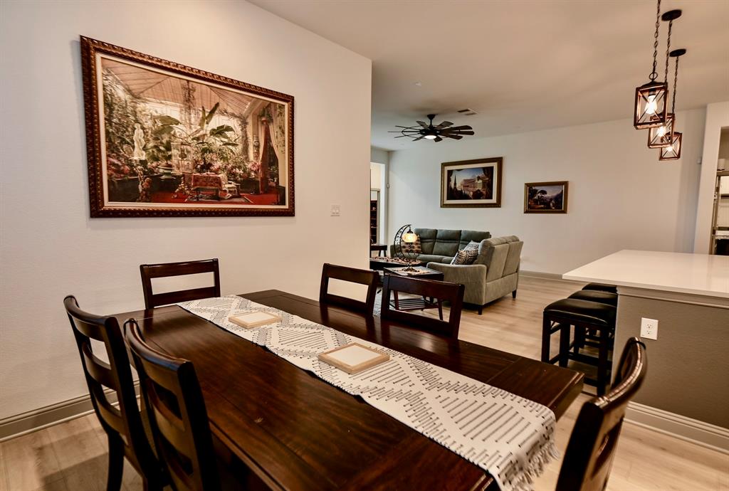 2609 Henley Way Venus, TX 76084 - Photo 17 of 40 a bedroom with a bed and a table in it