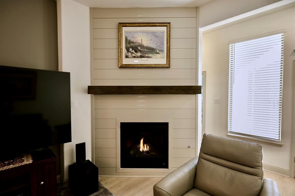 2609 Henley Way Venus, TX 76084 - Photo 24 of 40 a living room with furniture and a fireplace