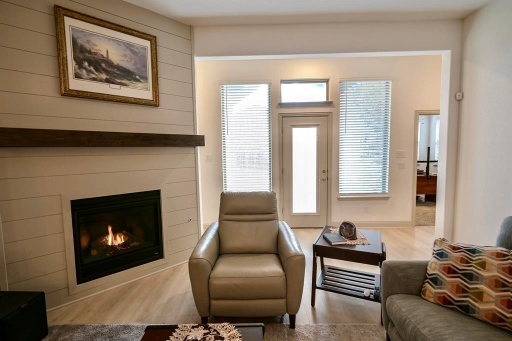 2609 Henley Way Venus, TX 76084 - Photo 25 of 40 a living room with furniture and a fireplace