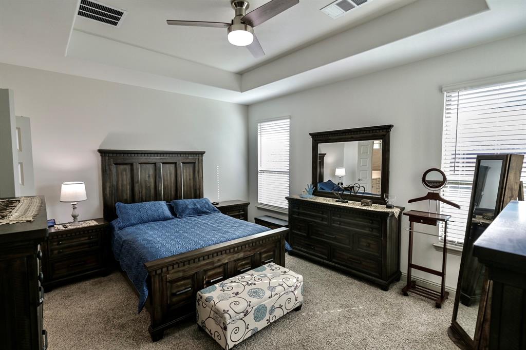 2609 Henley Way Venus, TX 76084 - Photo 26 of 40 a living room with furniture and a flat screen tv