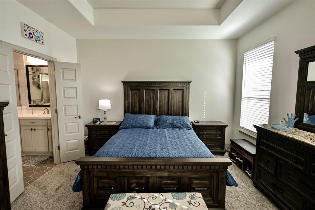 2609 Henley Way Venus, TX 76084 - Photo 28 of 40 a kitchen with a stove a sink and a refrigerator