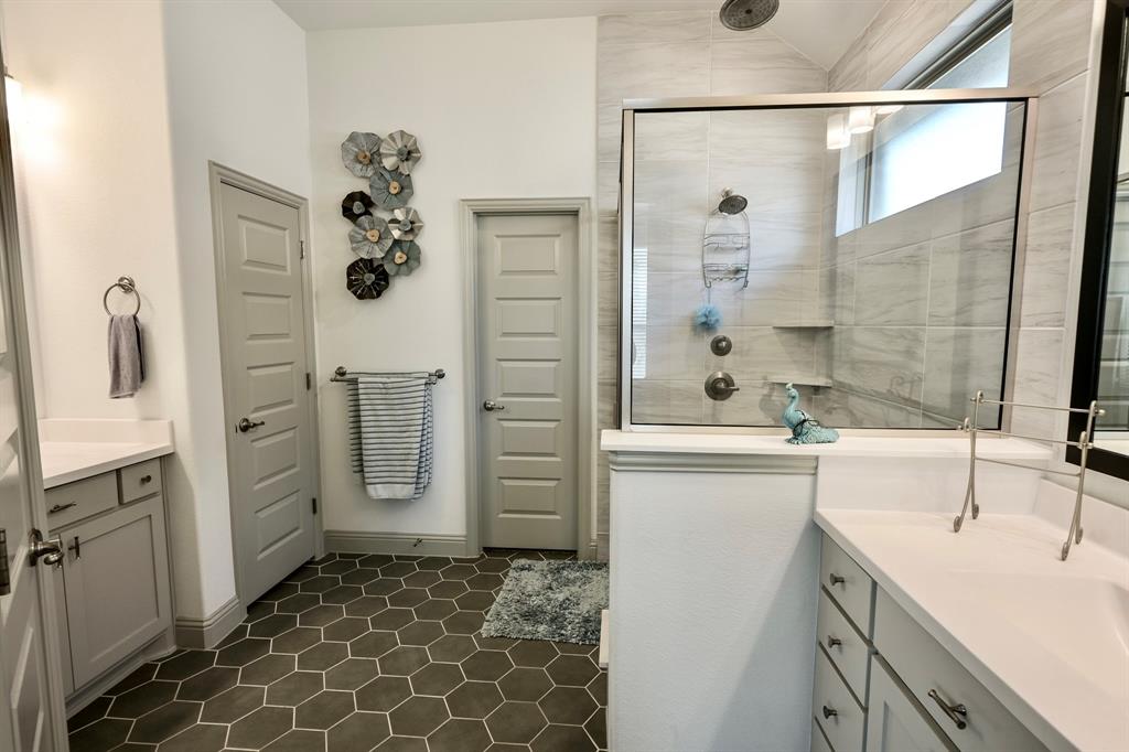 2609 Henley Way Venus, TX 76084 - Photo 30 of 40 a bathroom with a double vanity sink a mirror a shower and vanity