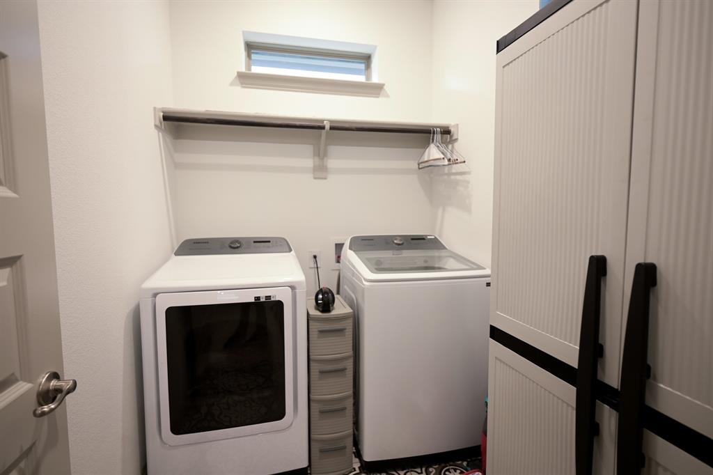 2609 Henley Way Venus, TX 76084 - Photo 31 of 40 a utility room with dryer and washer