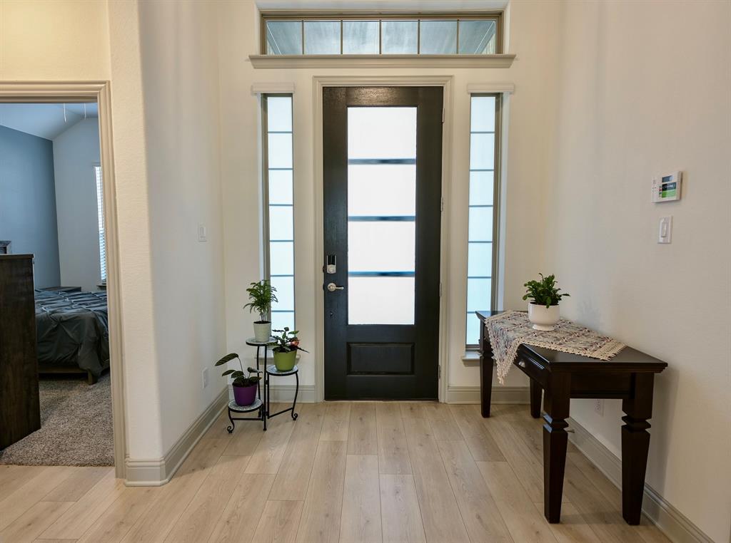 2609 Henley Way Venus, TX 76084 - Photo 6 of 40 a view of a workspace with furniture and a window
