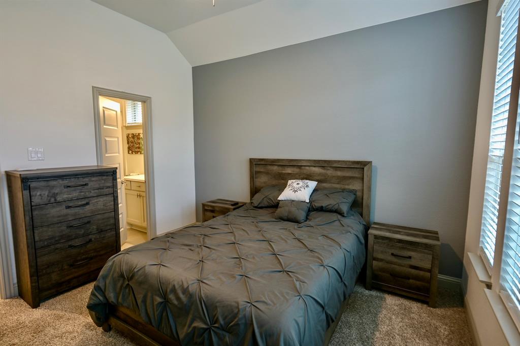 2609 Henley Way Venus, TX 76084 - Photo 9 of 40 a bedroom with a bed and a window