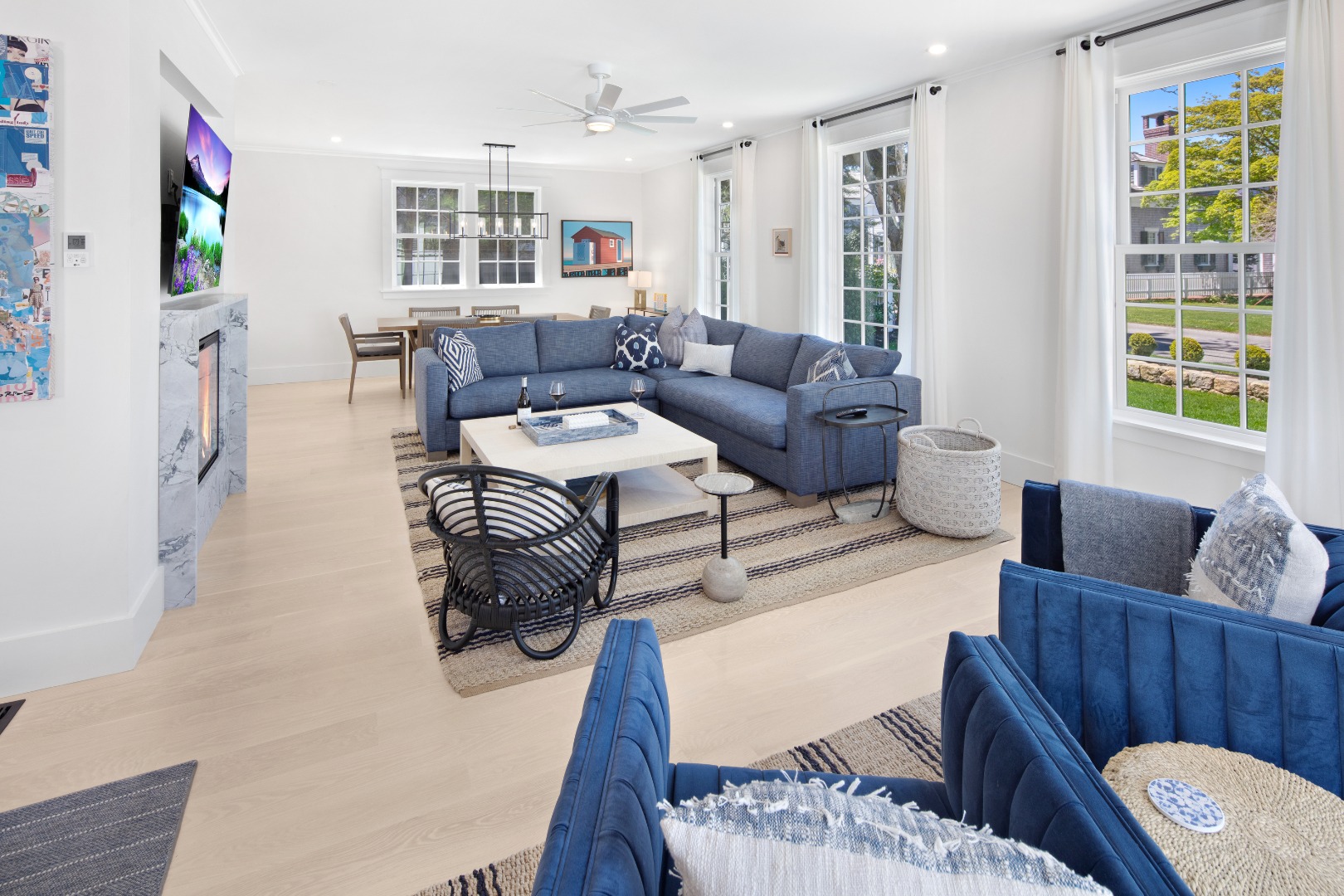 95 School Street Edgartown, MA 02539 - Photo 12 of 57 a living room with furniture and a flat screen tv