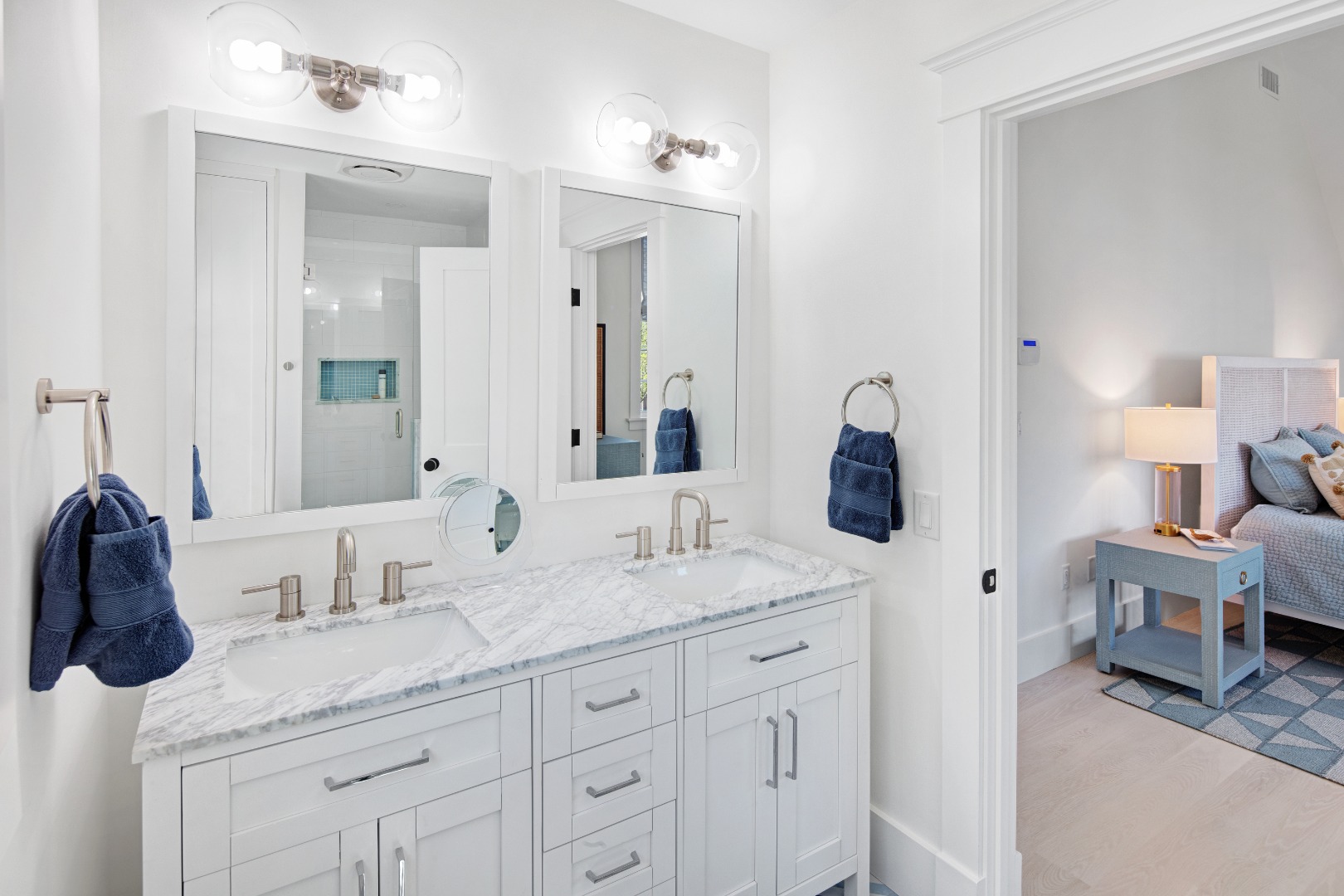 95 School Street Edgartown, MA 02539 - Photo 24 of 57 a bathroom with a granite countertop sink and a mirror