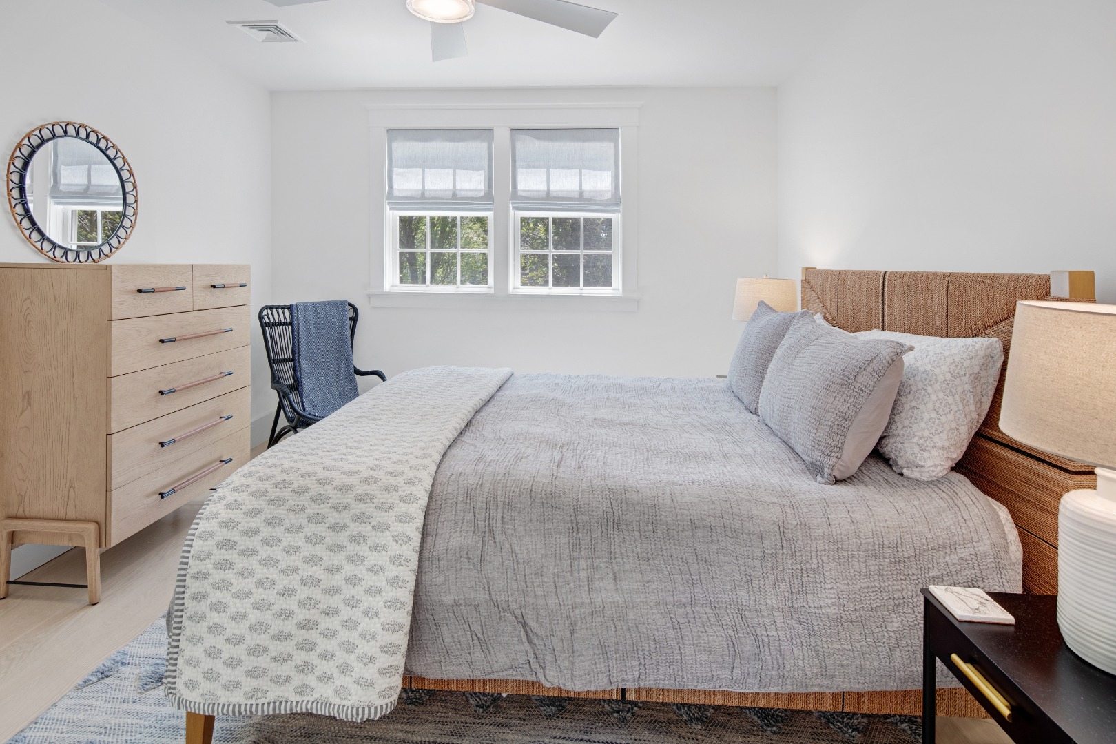 95 School Street Edgartown, MA 02539 - Photo 27 of 57 a bedroom with a bed and a window
