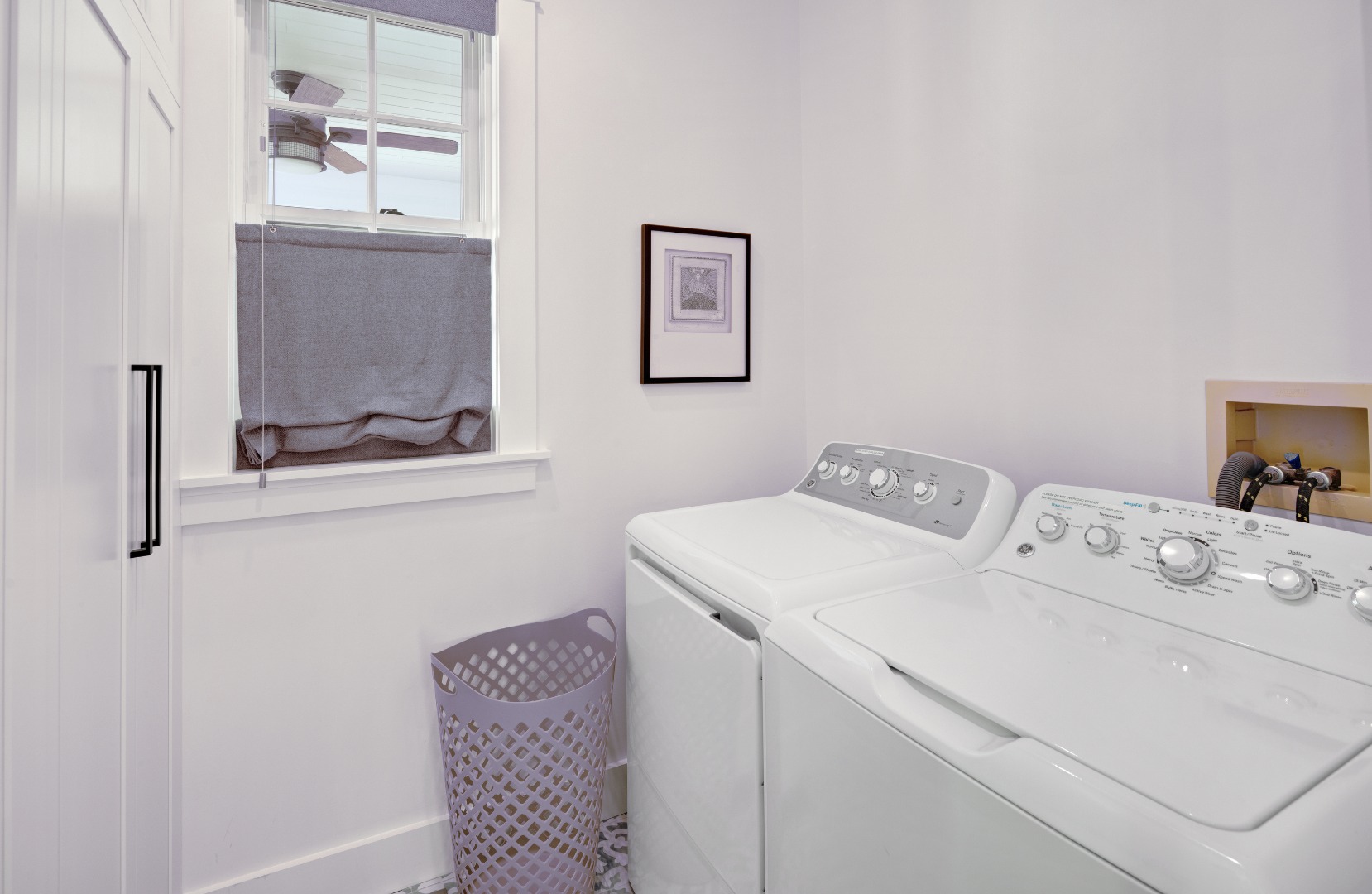 95 School Street Edgartown, MA 02539 - Photo 33 of 57 a utility room with dryer and washer