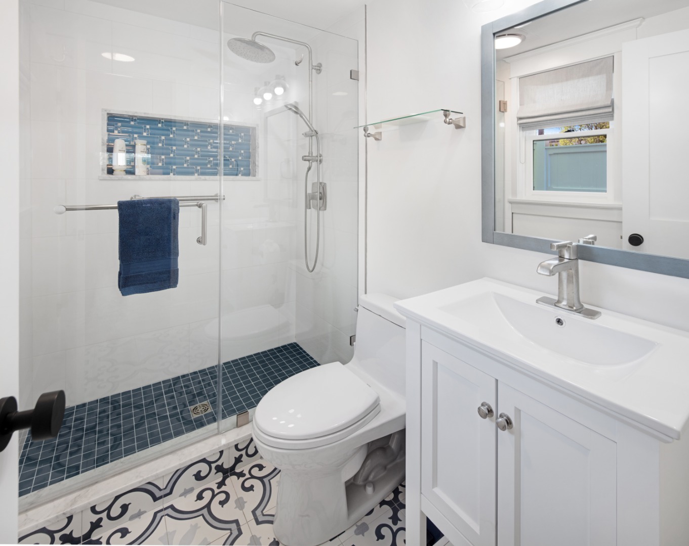 95 School Street Edgartown, MA 02539 - Photo 43 of 57 a bathroom with a sink a toilet and shower