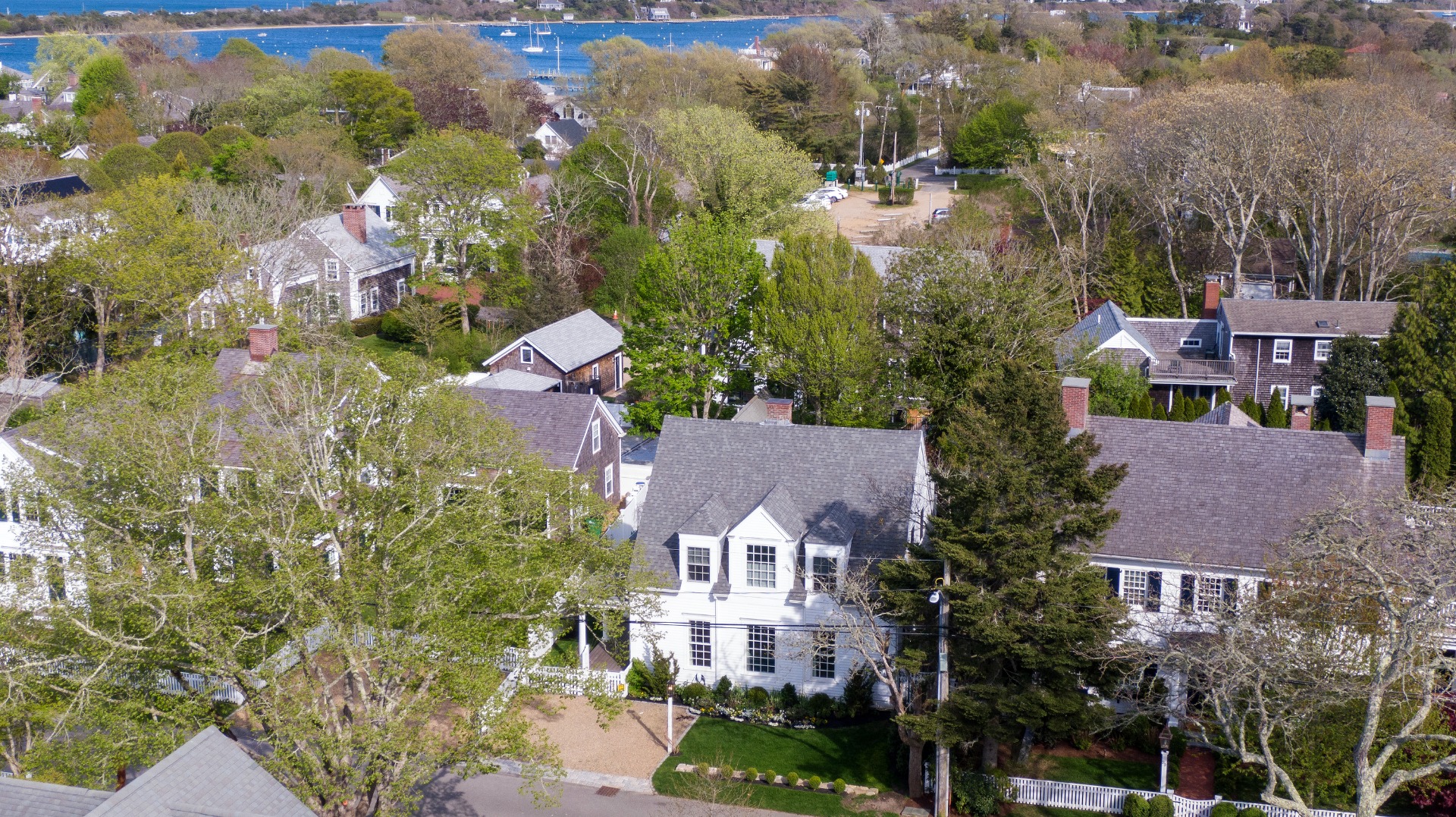 95 School Street Edgartown, MA 02539 - Photo 44 of 57 an aerial view of multiple houses with yard