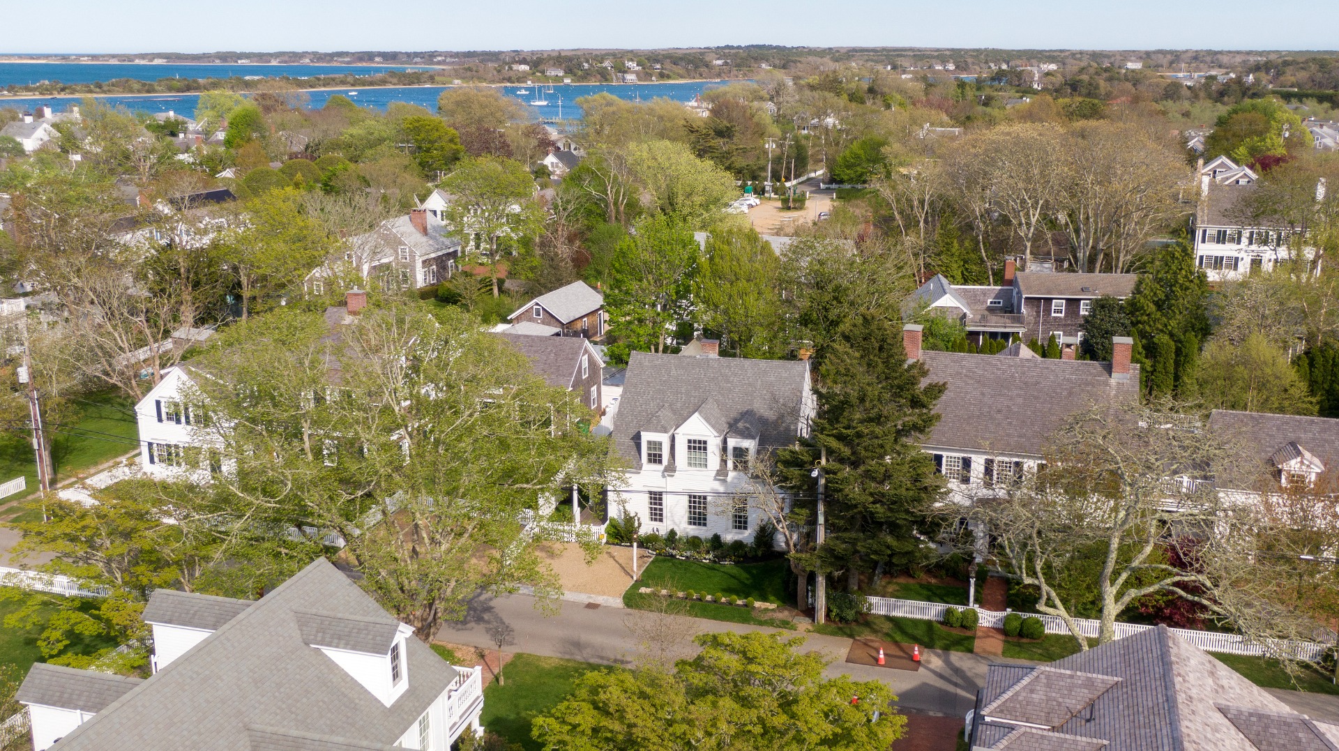 95 School Street Edgartown, MA 02539 - Photo 46 of 57 an aerial view of residential houses with outdoor space and swimming pool