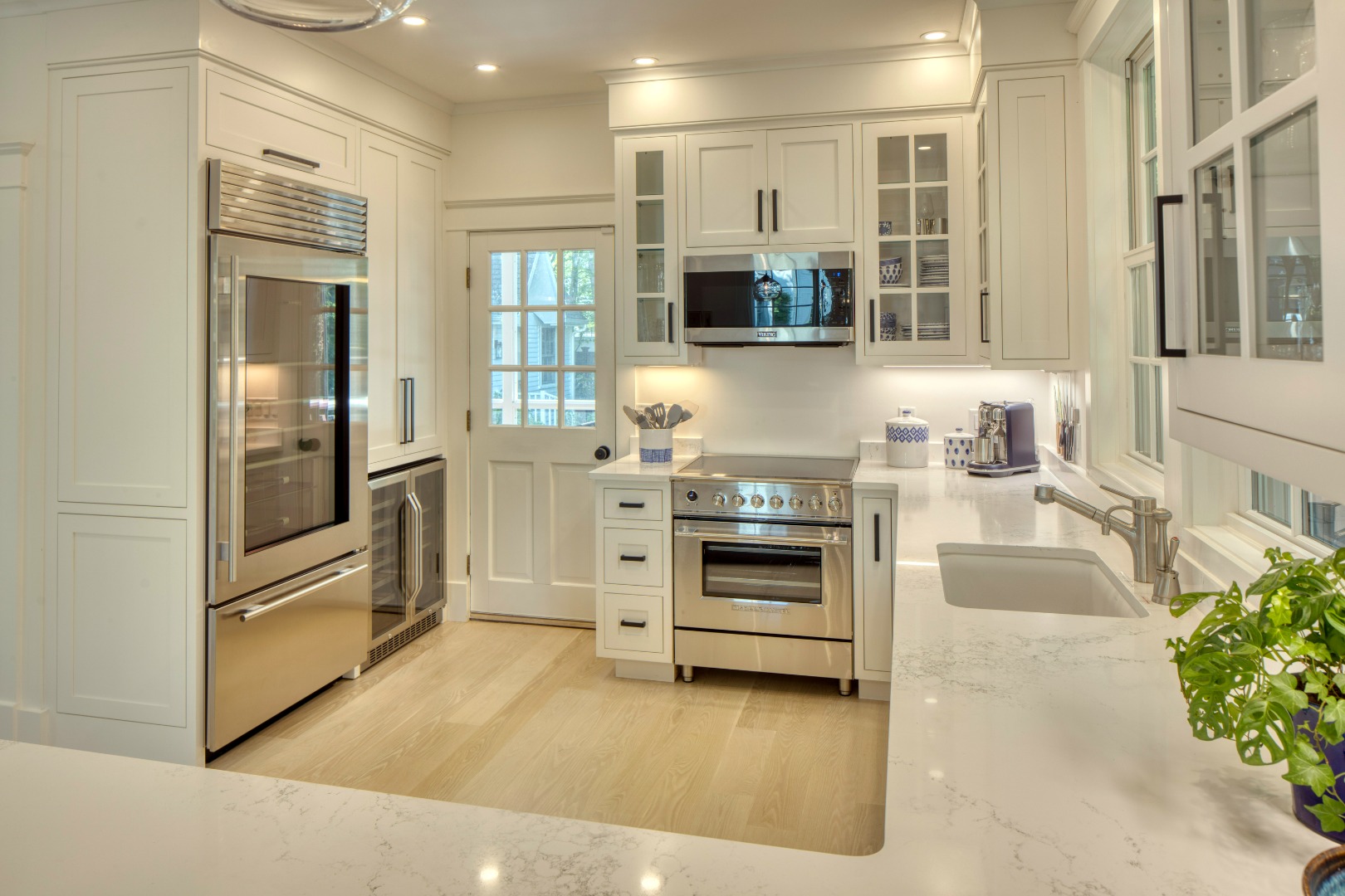 95 School Street Edgartown, MA 02539 - Photo 57 of 57 a kitchen with stainless steel appliances a refrigerator and a sink