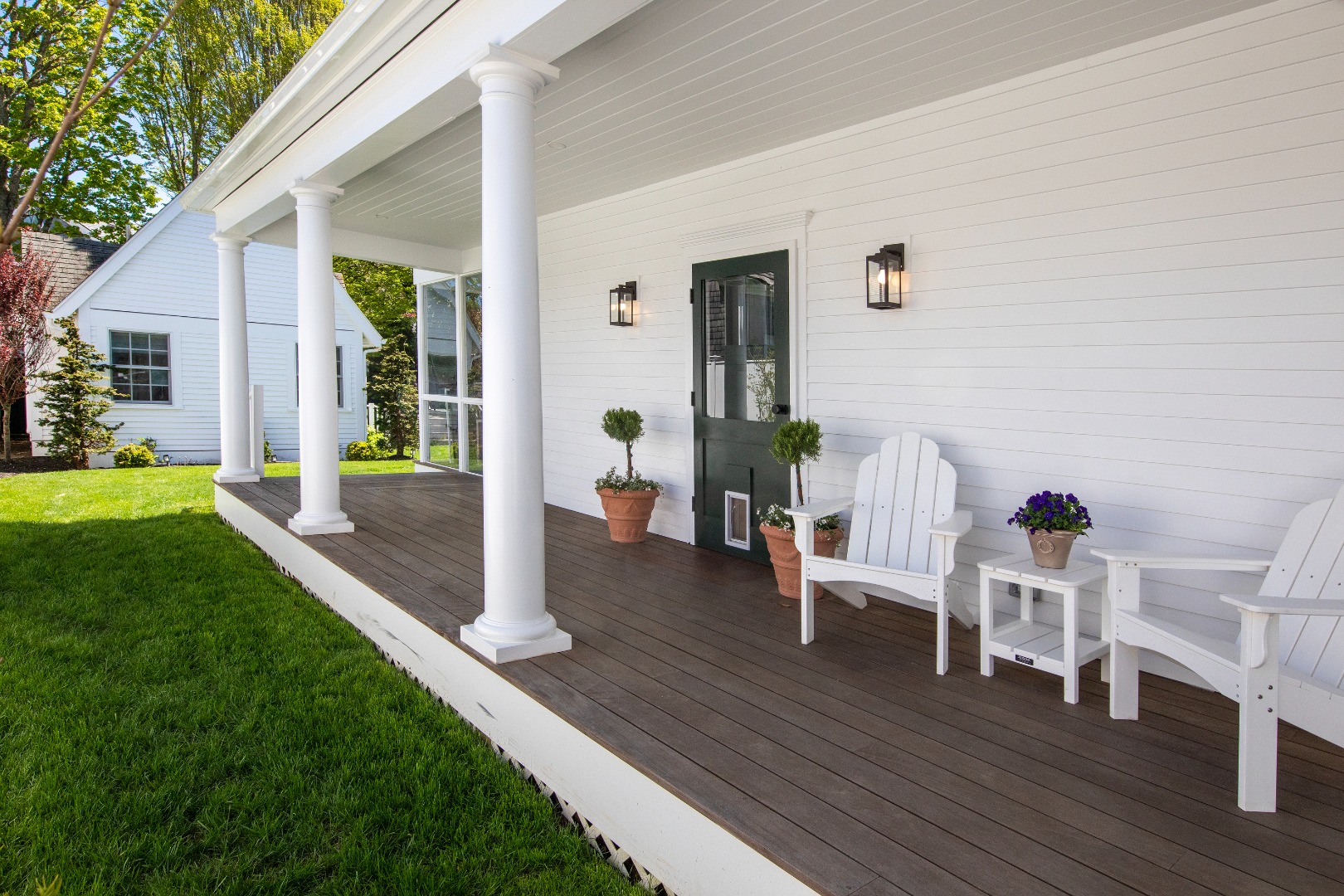 95 School Street Edgartown, MA 02539 - Photo 6 of 57 a view of a house with backyard porch and sitting area