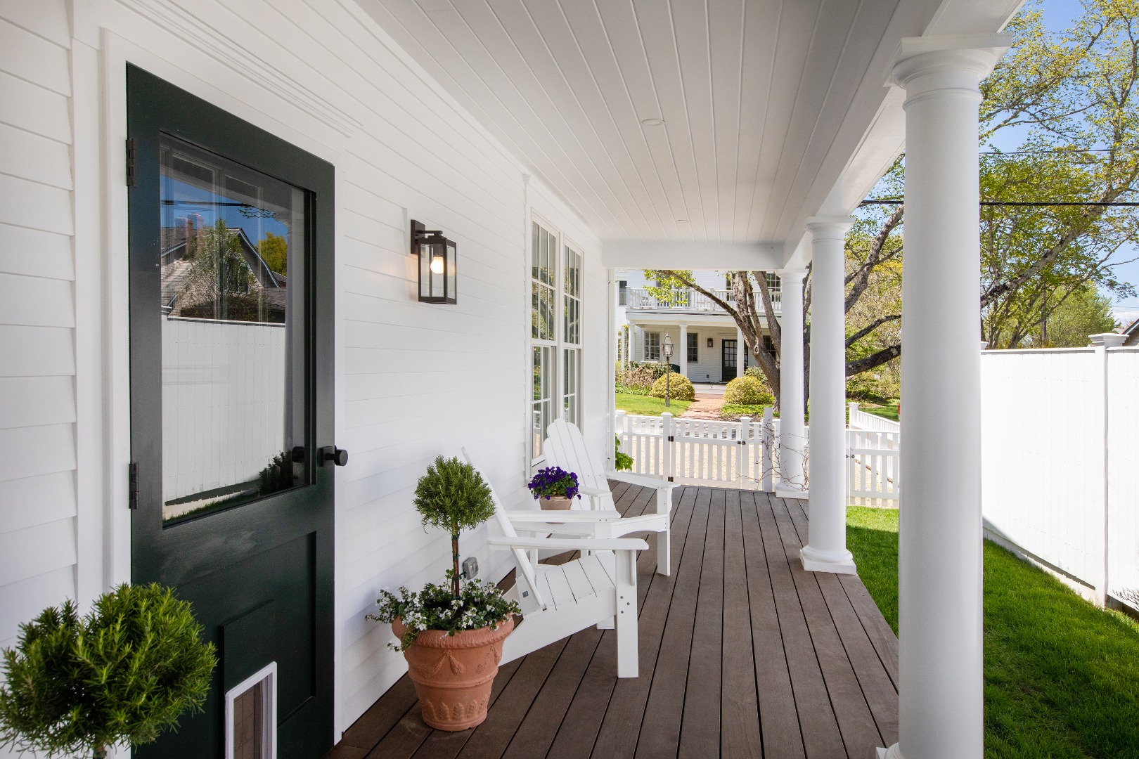 95 School Street Edgartown, MA 02539 - Photo 8 of 57 a view of a living room filled with furniture and a potted plant