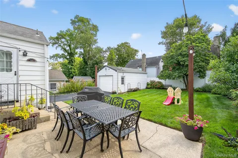a front view of a house with seating space