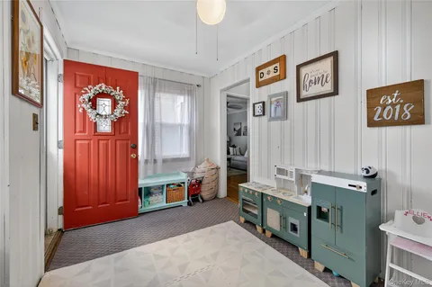 a room with furniture and window