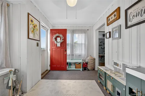 a view of an entryway with furniture