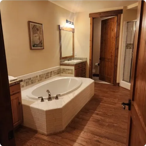 a bedroom with a bed and a chair