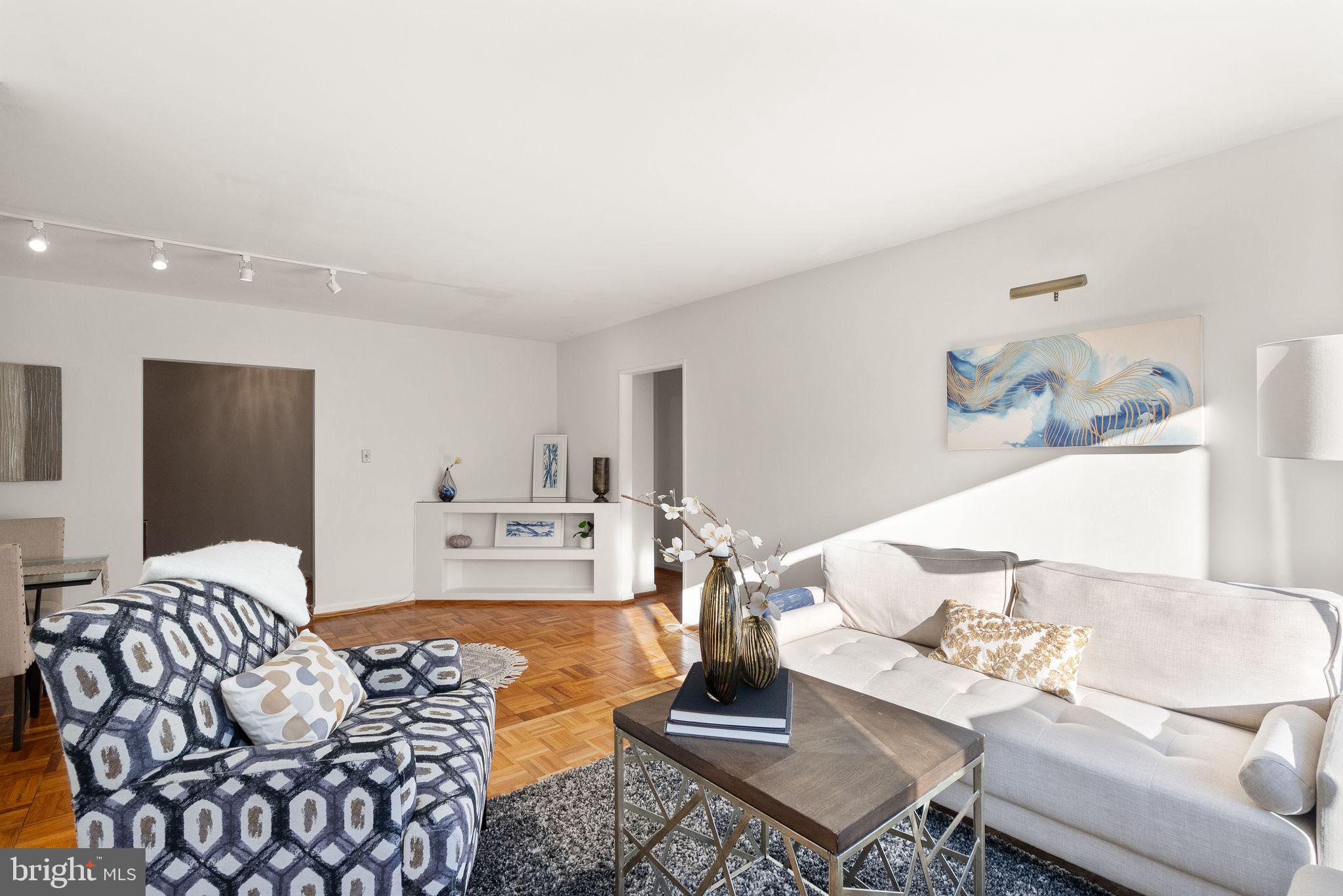 4200 Cathedral Avenue Northwest, Unit 812 Washington, DC 20016 - Photo 22 of 45 Living room going to bedrooms