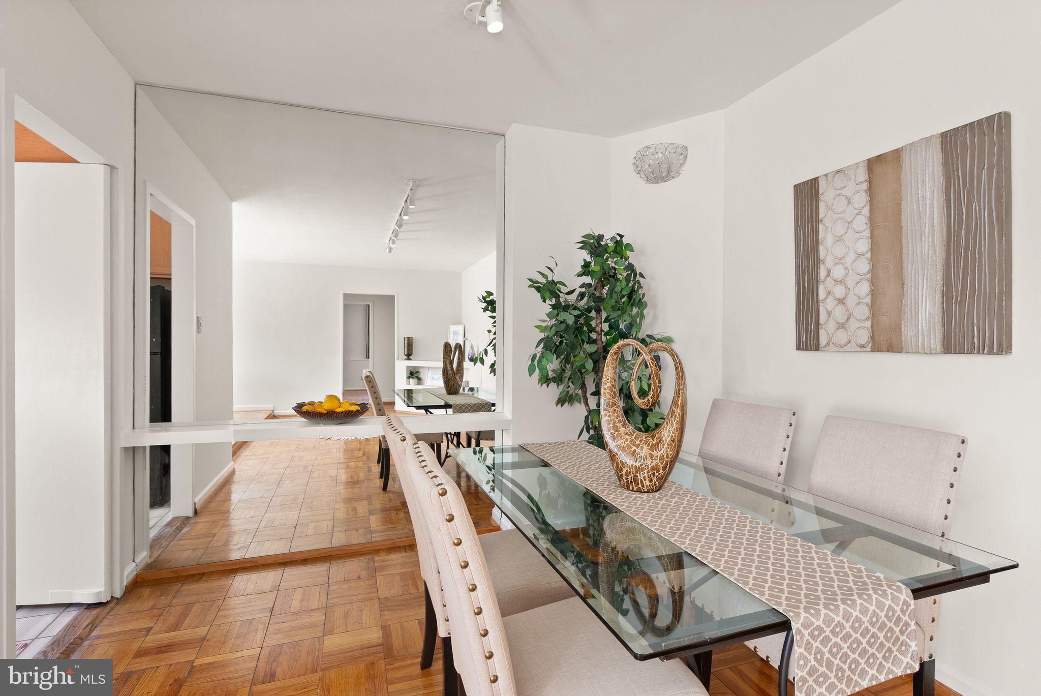 4200 Cathedral Avenue Northwest, Unit 812 Washington, DC 20016 - Photo 25 of 45 Dining area, kitchen door on the left
