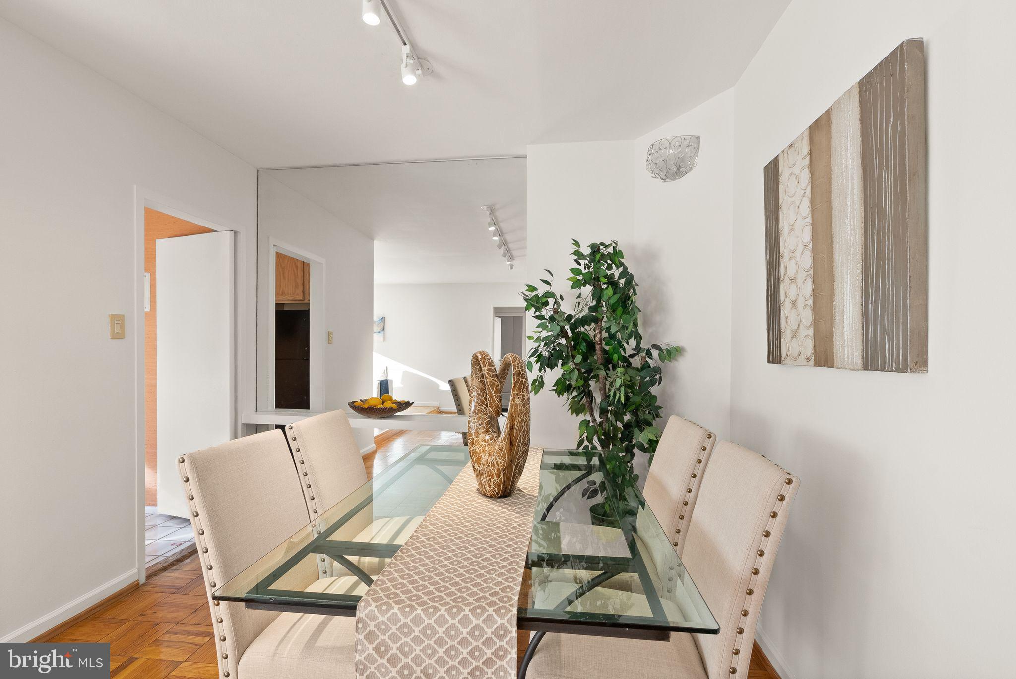 4200 Cathedral Avenue Northwest, Unit 812 Washington, DC 20016 - Photo 26 of 45 Dining area, kitchen door on the left