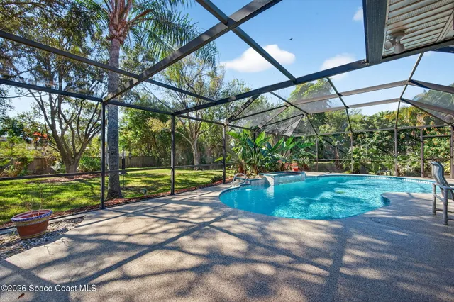 a view of a backyard with a small cabin