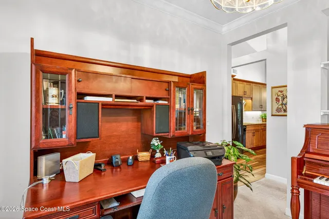 a room with furniture and musical instruments