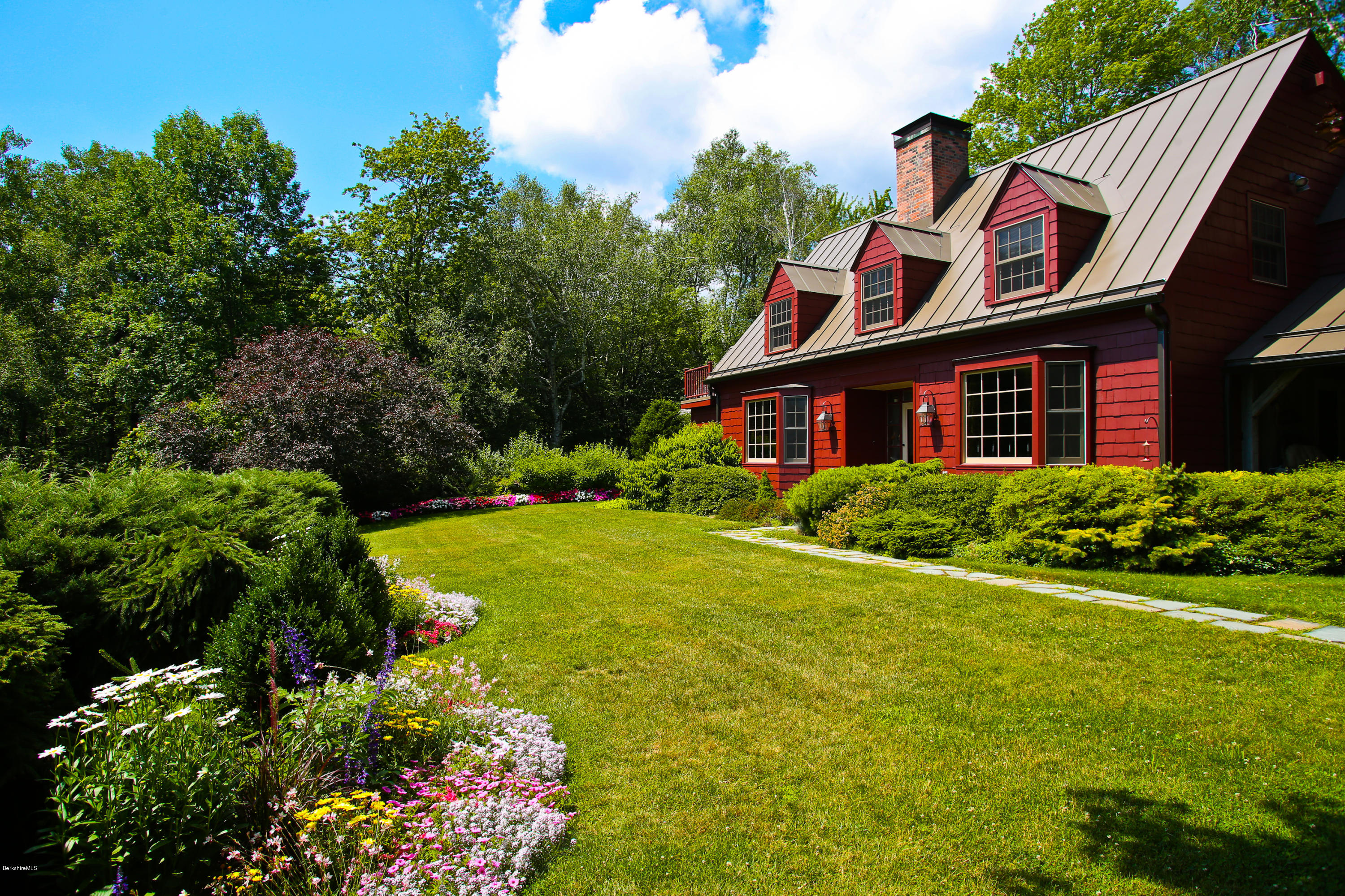 759 Hancock Road Williamstown, MA 01267 - Photo 2 of 71 a front view of a house with a yard