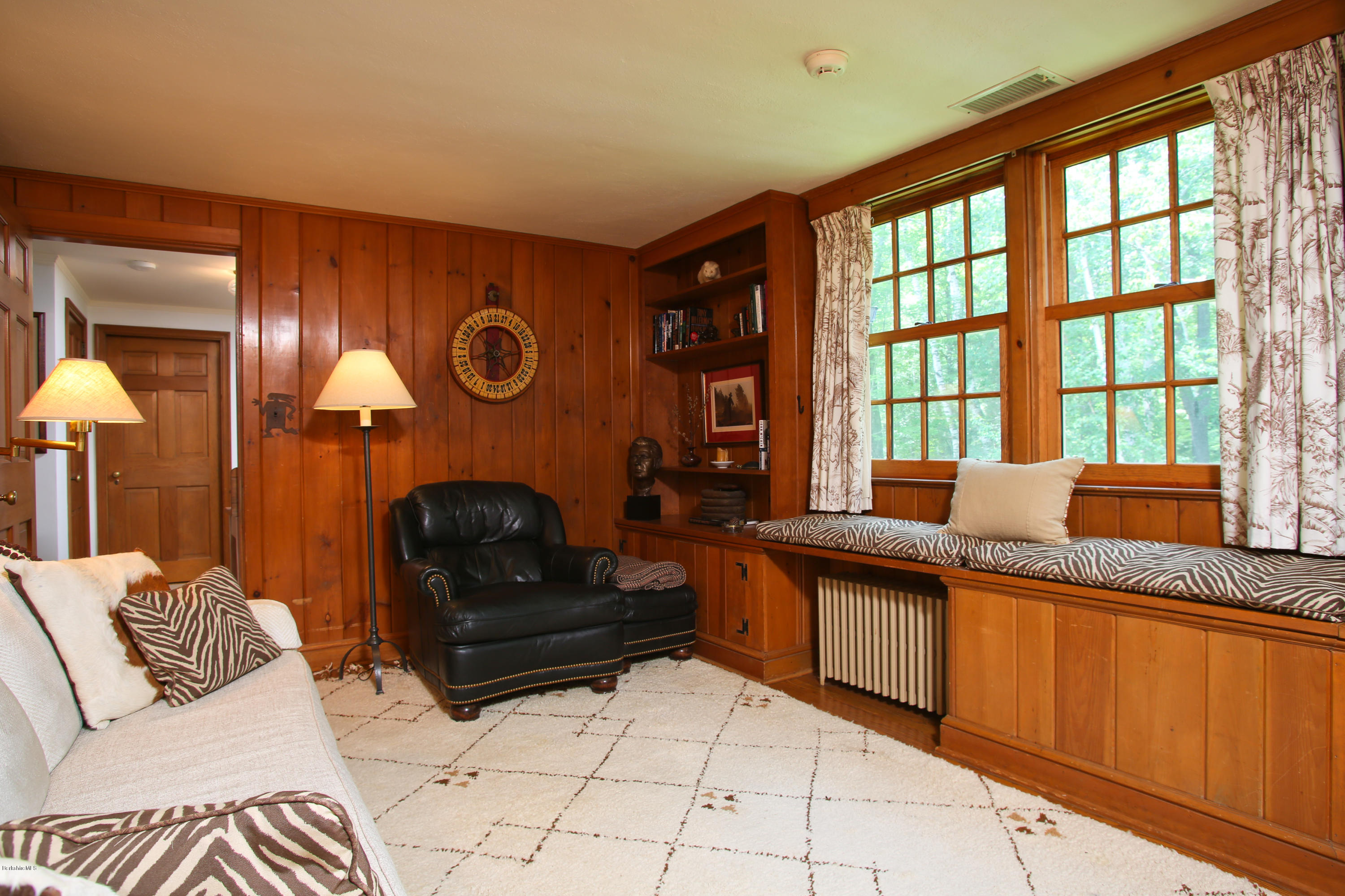 759 Hancock Road Williamstown, MA 01267 - Photo 26 of 71 a living room with furniture and a large window
