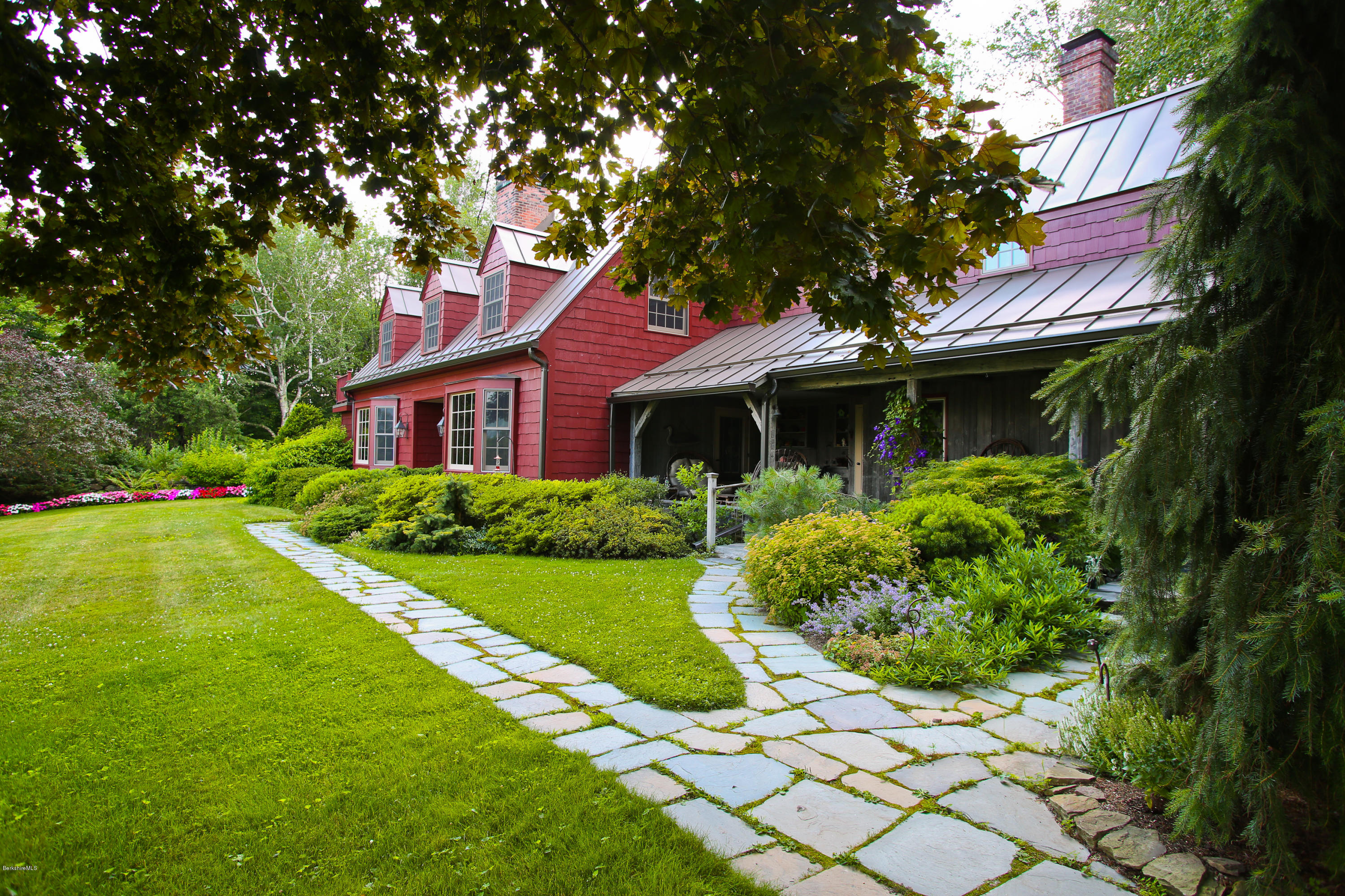 759 Hancock Road Williamstown, MA 01267 - Photo 4 of 71 a front view of a house with a yard
