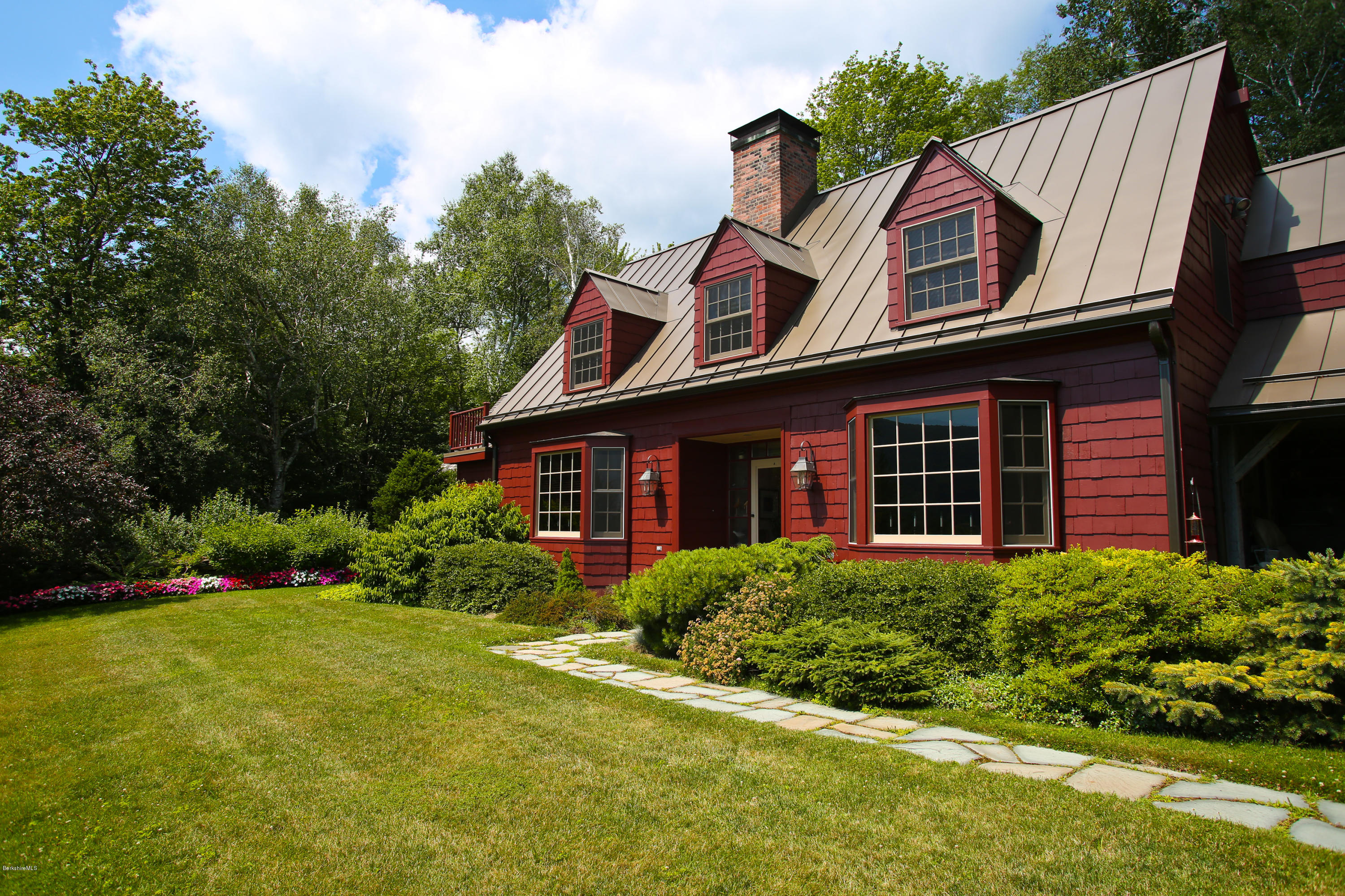 759 Hancock Road Williamstown, MA 01267 - Photo 38 of 71 a front view of a house with a yard