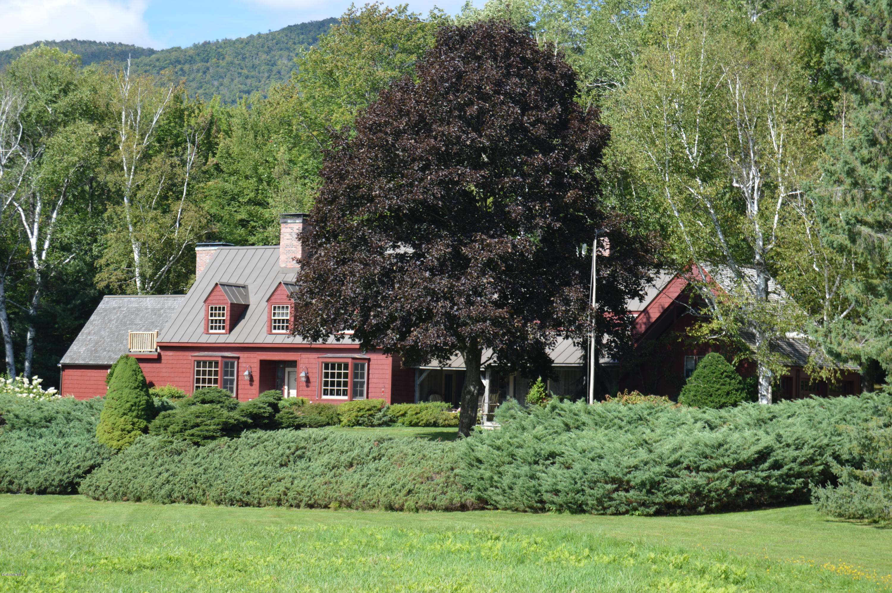 759 Hancock Road Williamstown, MA 01267 - Photo 39 of 71 a front view of a house with a yard and green space