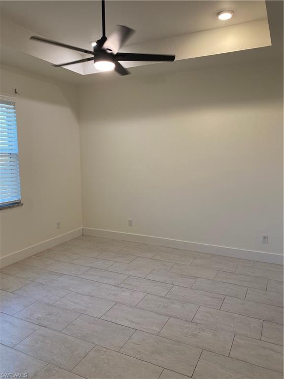 5314 30th Street Southwest Lehigh Acres, FL 33973 - Photo 6 of 19 a view of an empty room