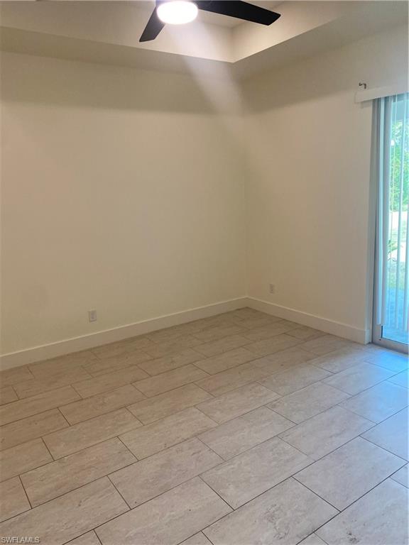 5314 30th Street Southwest Lehigh Acres, FL 33973 - Photo 10 of 19 a view of a room with an empty space and window