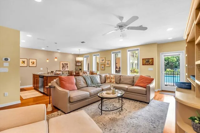 a bathroom with a double vanity sink toilet mirror and shower