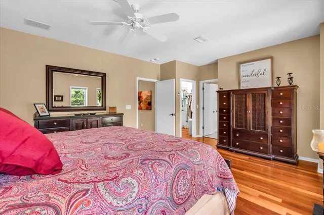 a bedroom with a bed and furniture