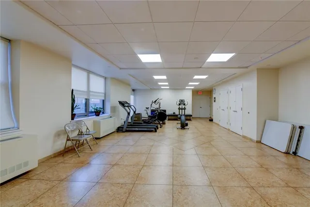 a view of a backyard with sitting area