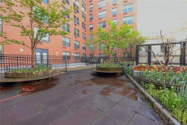a view of a blue building with many windows